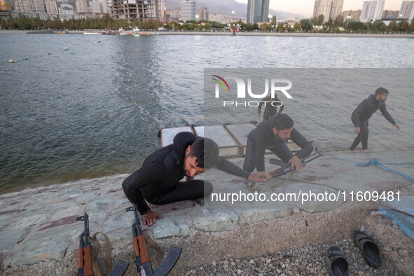 Islamic Revolutionary Guard Corps (IRGC) military personnel take part in a war game, which is a reconstruction of the Valfajr-8 military ope...