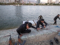 Islamic Revolutionary Guard Corps (IRGC) military personnel take part in a war game, which is a reconstruction of the Valfajr-8 military ope...