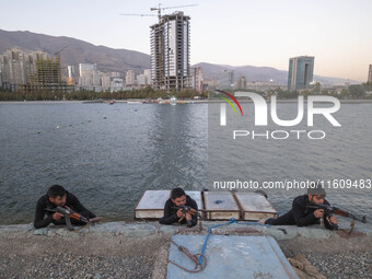 Islamic Revolutionary Guard Corps (IRGC) military personnel take part in a war game, which is a reconstruction of the Valfajr-8 military ope...