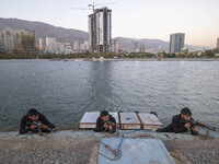 Islamic Revolutionary Guard Corps (IRGC) military personnel take part in a war game, which is a reconstruction of the Valfajr-8 military ope...