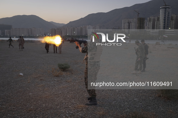 An Islamic Revolutionary Guard Corps (IRGC) military personnel takes part in a war game, which is a reconstruction of the Valfajr-8 military...