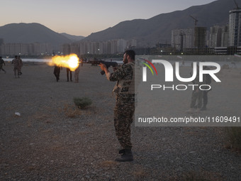 An Islamic Revolutionary Guard Corps (IRGC) military personnel takes part in a war game, which is a reconstruction of the Valfajr-8 military...