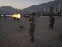 An Islamic Revolutionary Guard Corps (IRGC) military personnel takes part in a war game, which is a reconstruction of the Valfajr-8 military...