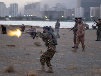 An Islamic Revolutionary Guard Corps (IRGC) military personnel takes part in a war game, which is a reconstruction of the Valfajr-8 military...