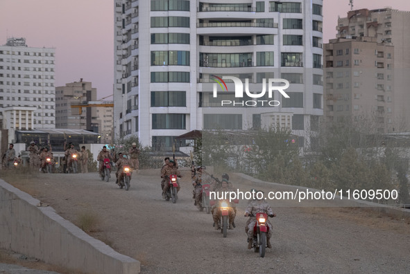 Islamic Revolutionary Guard Corps (IRGC) military personnel take part in a war game, which is a reconstruction of the Valfajr-8 military ope...