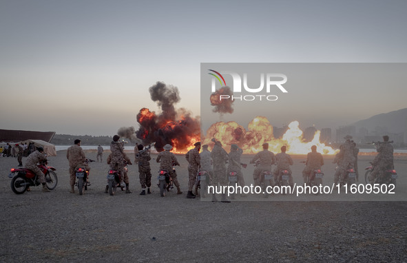 Islamic Revolutionary Guard Corps (IRGC) military personnel take part in a war game, which is a reconstruction of the Valfajr-8 military ope...