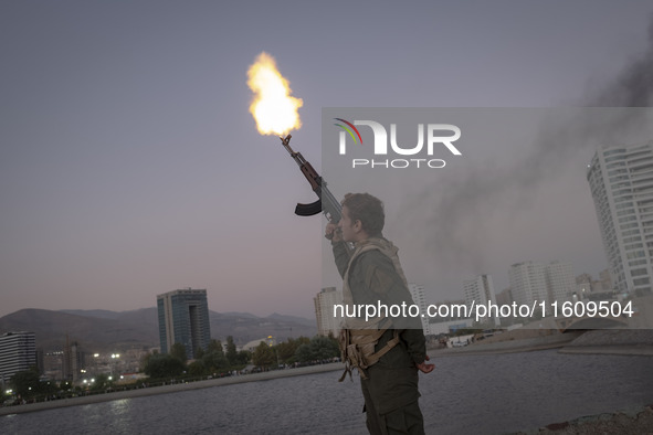 An Islamic Revolutionary Guard Corps (IRGC) military personnel takes part in a war game, which is a reconstruction of the Valfajr-8 military...