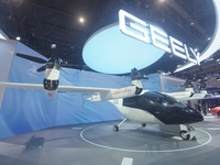 Visitors view the AE200 tilt-rotor electric vertical Take-off and Landing aircraft (eVTOL) at the Global Digital Trade Expo in Hangzhou, Chi...