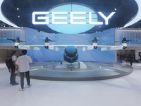 Visitors view the AE200 tilt-rotor electric vertical Take-off and Landing aircraft (eVTOL) at the Global Digital Trade Expo in Hangzhou, Chi...