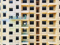 Builders step up construction at the construction site of the Zaofan resettlement area in Yuexi County, Anqing, China, on September 25, 2024...