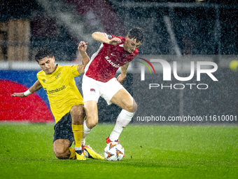 Elfsborg midfielder Besfort Zenelli and AZ Alkmaar forward Ruben van Bommel during the match between AZ and Elfsborg at the AZ Stadium for t...