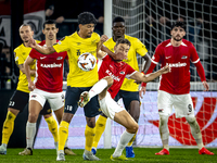 Elfsborg midfielder Ahmed Qasem and AZ Alkmaar midfielder Zico Buurmeester during the match between AZ and Elfsborg at the AZ Stadium for th...