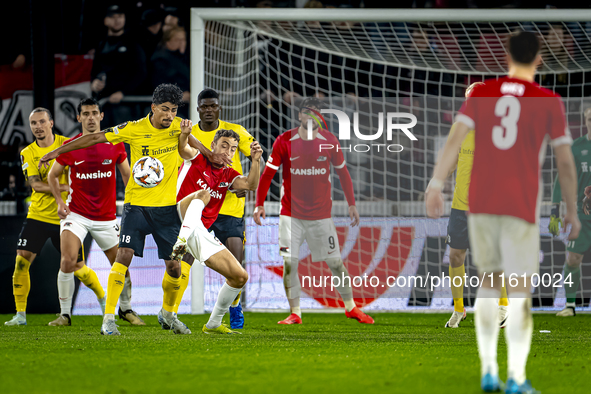 Elfsborg midfielder Ahmed Qasem and AZ Alkmaar midfielder Zico Buurmeester during the match between AZ and Elfsborg at the AZ Stadium for th...