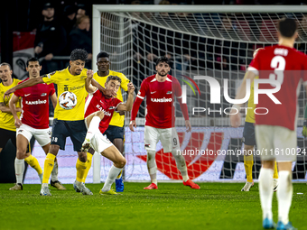 Elfsborg midfielder Ahmed Qasem and AZ Alkmaar midfielder Zico Buurmeester during the match between AZ and Elfsborg at the AZ Stadium for th...