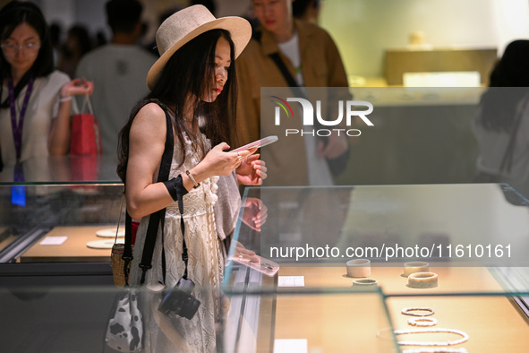 Visitors visit the Nanjing Museum in Nanjing, China, on September 26, 2024. By the end of August 2024, the 6,833 museums officially register...