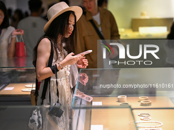 Visitors visit the Nanjing Museum in Nanjing, China, on September 26, 2024. By the end of August 2024, the 6,833 museums officially register...