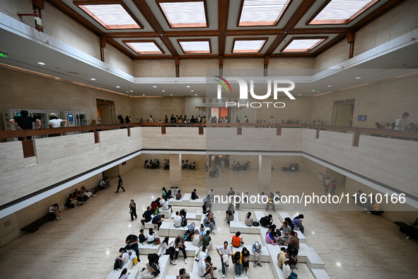 Visitors visit the Nanjing Museum in Nanjing, China, on September 26, 2024. By the end of August 2024, the 6,833 museums officially register...