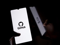 The GitHub logo displays on a smartphone screen in Athens, Greece, on September 26, 2024. (