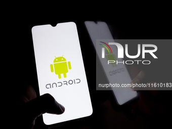 The Android logo displays on a smartphone screen in Athens, Greece, on September 26, 2024. (