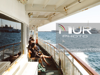 Daily life in Istanbul, Turkey, on September 25. People travel by ferry in the Sea of Marmara. (