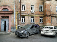 Cars damaged by falling wreckage of a downed Russian 'Shahed' drone in the Pechersk district of Kyiv, Ukraine, on September 26, 2024. NO USE...