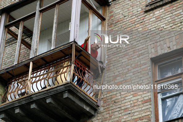 A residential building is damaged by falling wreckage of a downed Russian 'Shahed' drone in the Pechersk district of Kyiv, Ukraine, on Septe...