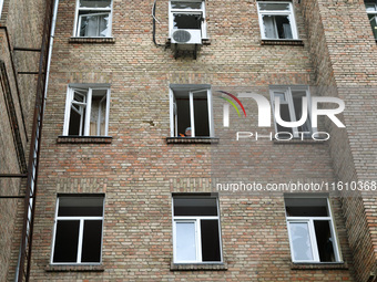 A residential building is damaged by falling wreckage of a downed Russian 'Shahed' drone in the Pechersk district of Kyiv, Ukraine, on Septe...