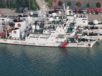 Coast guard ships are seen at a dock in Yantai, China, on September 26, 2024. (