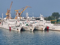 Coast guard ships are seen at a dock in Yantai, China, on September 26, 2024. (