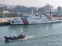 Coast guard ships are seen at a dock in Yantai, China, on September 26, 2024. (