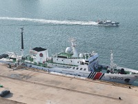 Coast guard ships are seen at a dock in Yantai, China, on September 26, 2024. (