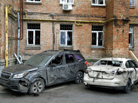 Cars damaged by falling wreckage of a downed Russian 'Shahed' drone in the Pechersk district of Kyiv, Ukraine, on September 26, 2024. NO USE...