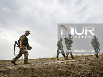 Servicemen of the 65th Separate Mechanized Brigade of the Armed Forces of Ukraine undergo combat cohesion in Ukraine, on September 12, 2024....