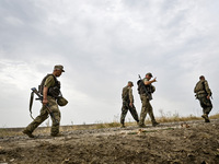 Servicemen of the 65th Separate Mechanized Brigade of the Armed Forces of Ukraine undergo combat cohesion in Ukraine, on September 12, 2024....