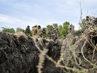 Servicemen of the 65th Separate Mechanized Brigade of the Armed Forces of Ukraine undergo combat cohesion in Ukraine, on September 12, 2024....