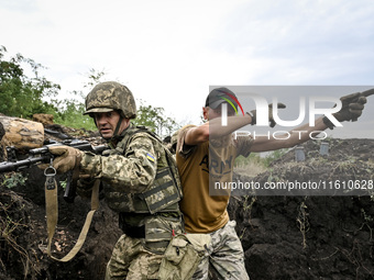 A combat training instructor (call sign ''Vokha'') is pictured during the combat coordination of the 65th Separate Mechanized Brigade of the...