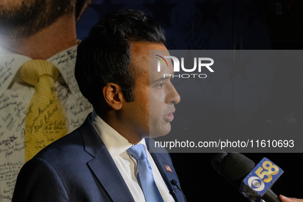 Vivek Ramaswamy speaks to the press during a press gaggle after the town hall.  In Waukesha, Wisconsin., on September 25, 2024. 