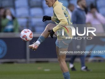 Alanna Kennedy #14 of Manchester City W.F.C. warms up during the UEFA Women's Champions League Second Round 2nd Leg match between Manchester...