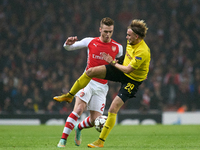 Calum Chambers of Arsenal is confronted by Marcel Schmelzer of Borussia Dortmund during the UEFA Champions League Group D soccer match betwe...