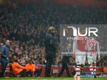 Jurgen Klopp, head coach of Borussia Dortmund, gestures during the UEFA Champions League Group D soccer match between Arsenal and Borussia D...