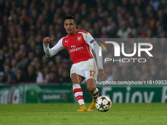 Alexis Sanchez of Arsenal is in action during the UEFA Champions League Group D soccer match between Arsenal and Borussia Dortmund at the Em...