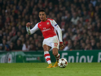 Alexis Sanchez of Arsenal is in action during the UEFA Champions League Group D soccer match between Arsenal and Borussia Dortmund at the Em...