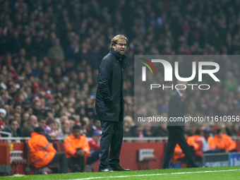 Jurgen Klopp, head coach of Borussia Dortmund, gestures during the UEFA Champions League Group D soccer match between Arsenal and Borussia D...