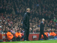 Jurgen Klopp, head coach of Borussia Dortmund, gestures during the UEFA Champions League Group D soccer match between Arsenal and Borussia D...