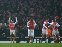 Alexis Sanchez of Arsenal gestures in celebration after scoring the 2-0 goal for Arsenal during the UEFA Champions League Group D soccer mat...