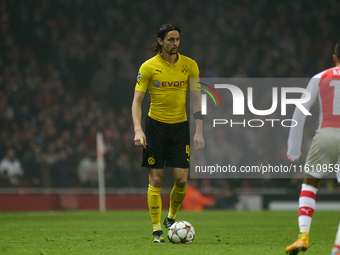 Neven Subotic of Borussia Dortmund is in action during the UEFA Champions League Group D soccer match between Arsenal and Borussia Dortmund...