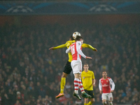 Pierre-Emerick Aubameyang of Borussia Dortmund competes for the ball with Nacho Monreal of Arsenal during the UEFA Champions League Group D...