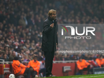 Jurgen Klopp, head coach of Borussia Dortmund, gestures during the UEFA Champions League Group D soccer match between Arsenal and Borussia D...