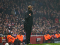 Jurgen Klopp, head coach of Borussia Dortmund, gestures during the UEFA Champions League Group D soccer match between Arsenal and Borussia D...