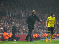 Jurgen Klopp, head coach of Borussia Dortmund, gestures during the UEFA Champions League Group D soccer match between Arsenal and Borussia D...